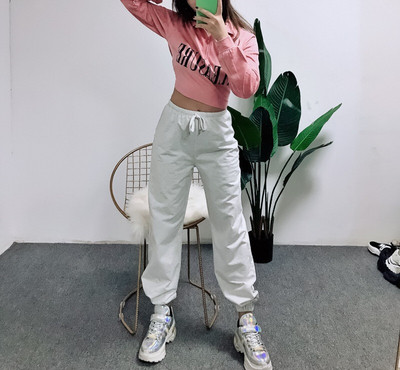 Модерен дамски панталон с връзки и висока талия в бял цвят