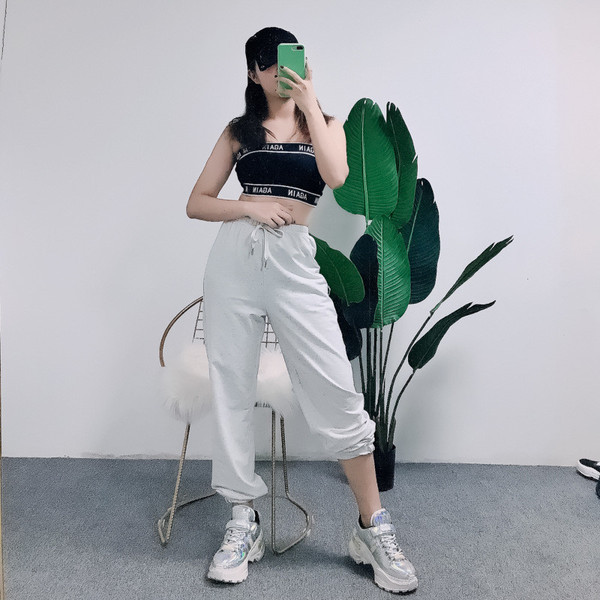 Модерен дамски панталон с връзки и висока талия в бял цвят