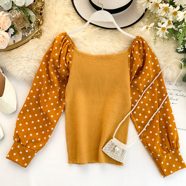 Modern női blúz kerek nyakkivágással, pöttyös ujjakkal, több színben