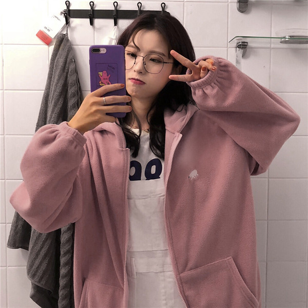 Női széles pulóver több színben cipzárral