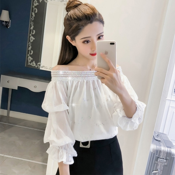 Aktuális női blúz rózsaszín és fehér színben, flitterekkel