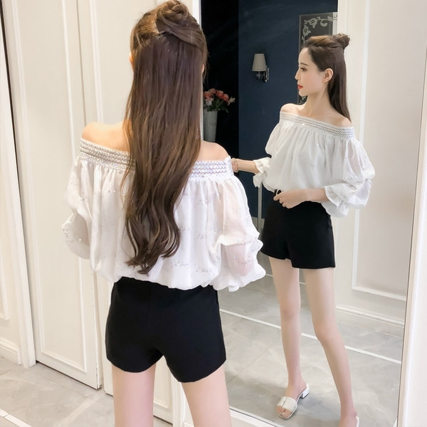 Aktuális női blúz rózsaszín és fehér színben, flitterekkel