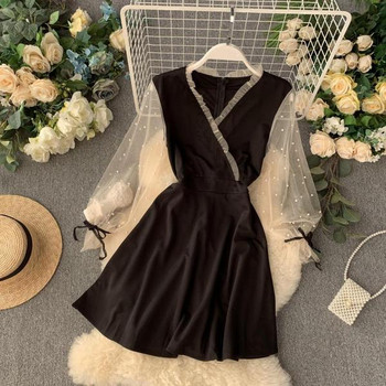 Rochie moderna de dama cu decolteu in V in negru si rosu