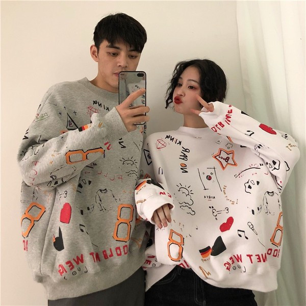 Női pulóver négy szín széles modellben