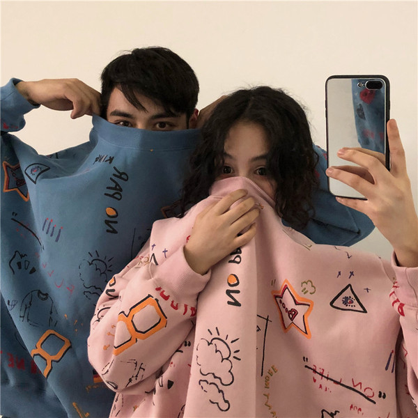 Női pulóver négy szín széles modellben