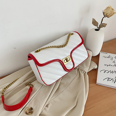 Modern női táska lánccal és fém csattal több színben