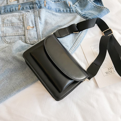 Elegáns kis kézitáska hosszú fogantyúval