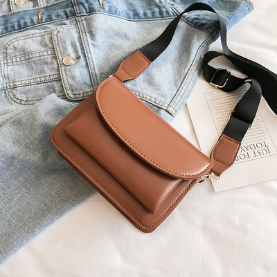 Elegáns kis kézitáska hosszú fogantyúval