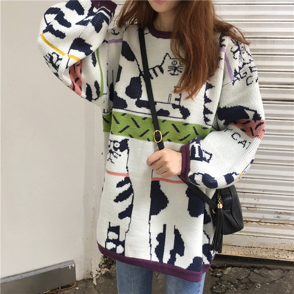 Női széles, hosszú pulóver ovális nyakkivágással