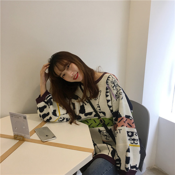 Női széles, hosszú pulóver ovális nyakkivágással