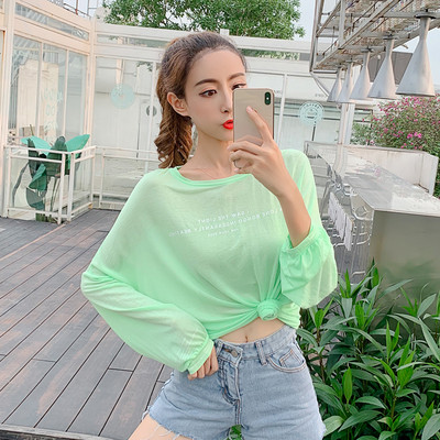 Női blúz zöld és narancssárga széles modellben