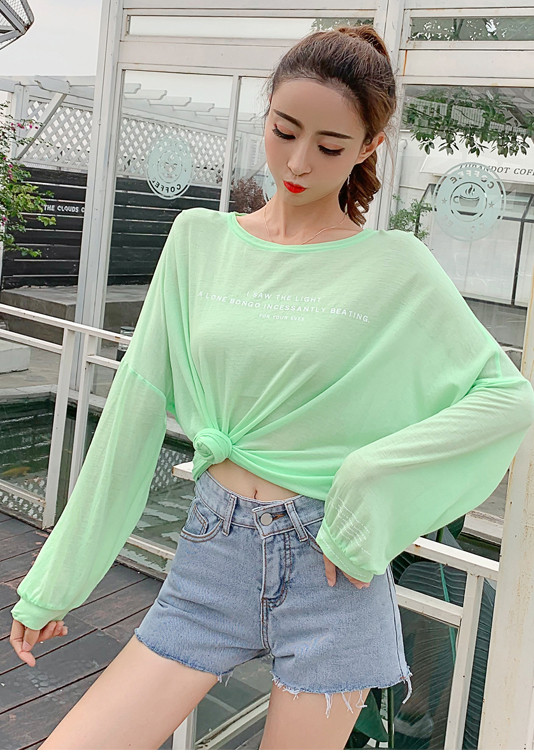 Női blúz zöld és narancssárga széles modellben