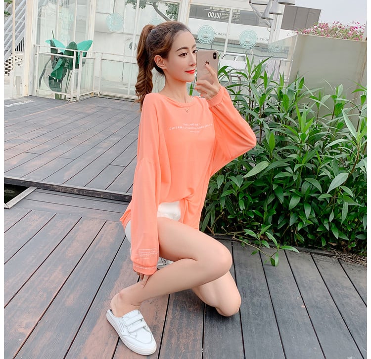 Női blúz zöld és narancssárga széles modellben