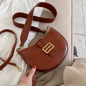 Női bőr táska fém csattal és hosszú fogantyúval