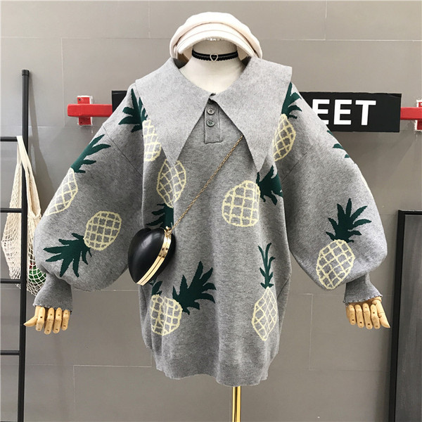 Modern női széles pulóver színes mintával szürke és fekete színben