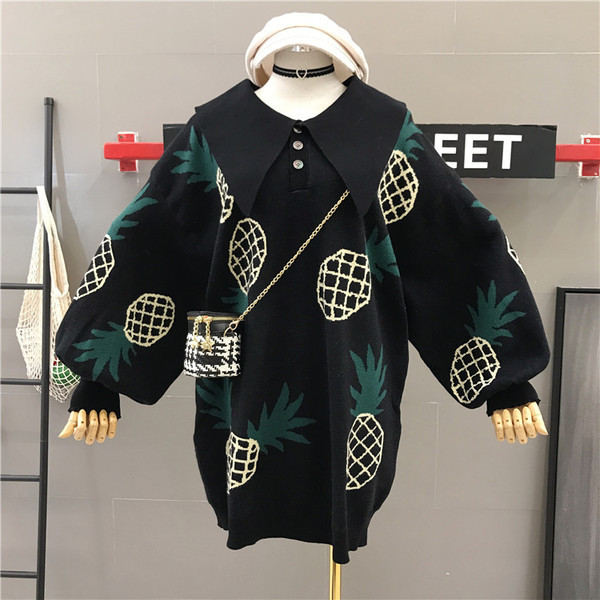 Modern női széles pulóver színes mintával szürke és fekete színben