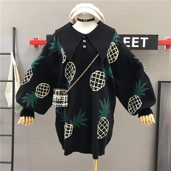 Modern női széles pulóver színes mintával szürke és fekete színben