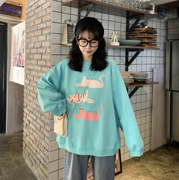 Kék színű széles női blúz, rátéttel