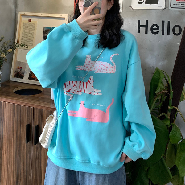 Kék színű széles női blúz, rátéttel