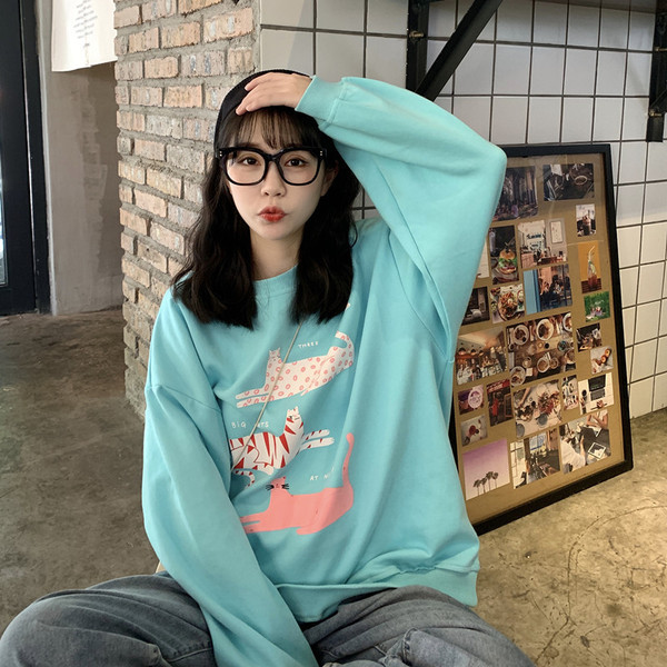 Kék színű széles női blúz, rátéttel