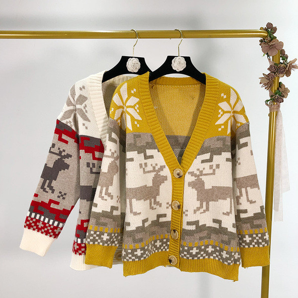 Női alkalmi mellény mély spitz nyakkivágással és mintás mintás gombokkal