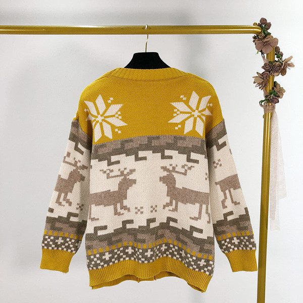 Női alkalmi mellény mély spitz nyakkivágással és mintás mintás gombokkal