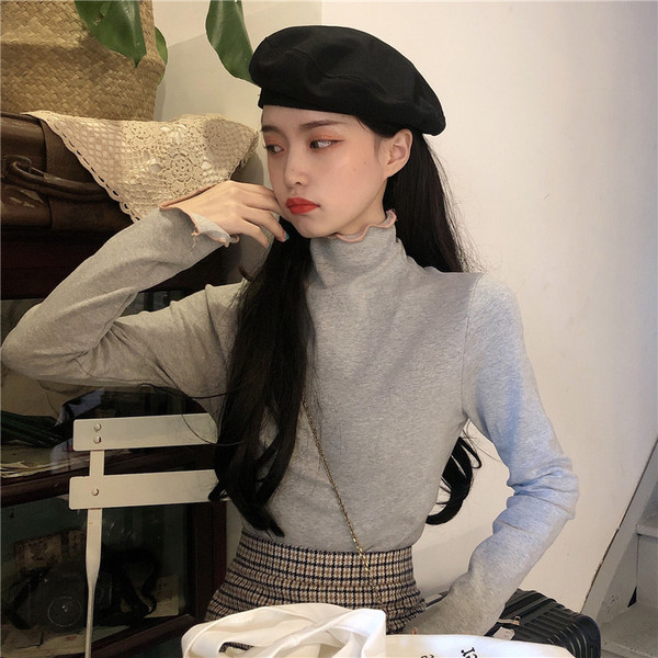 Női alkalmi blúz több színben, magas gallérral