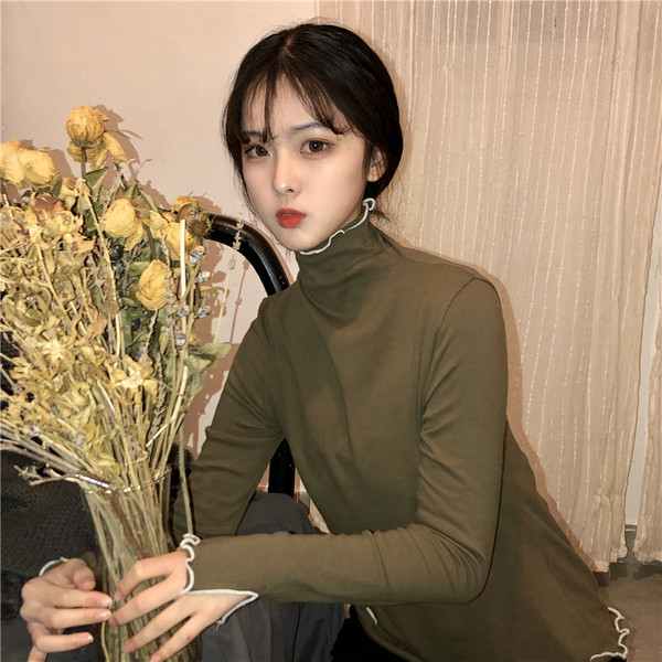 Női alkalmi blúz több színben, magas gallérral