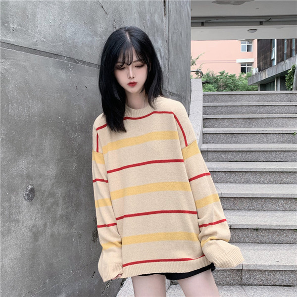 Női hosszú blúz ovális nyakkivágással és hosszú ujjal