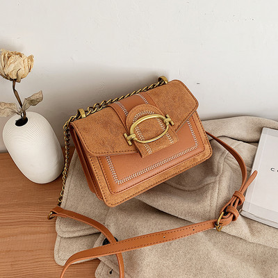 Modern női táska fém elemmel több színben