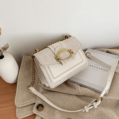 Modern női táska fém elemmel több színben