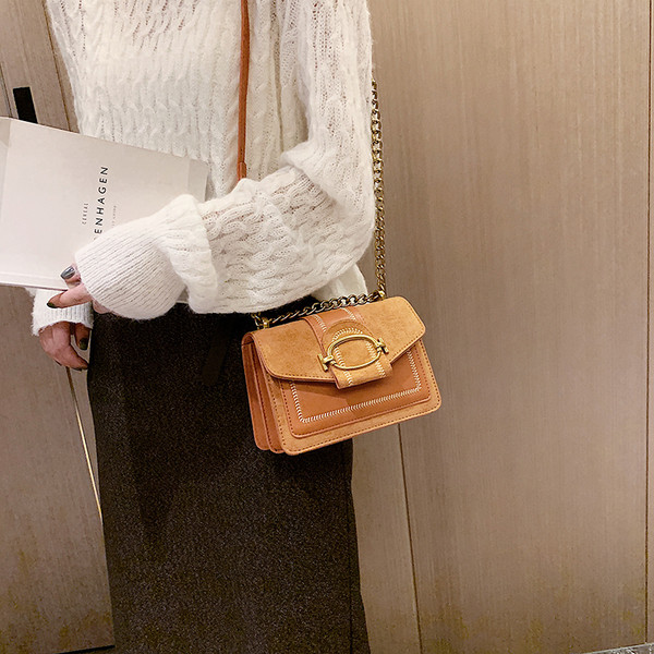 Modern női táska fém elemmel több színben