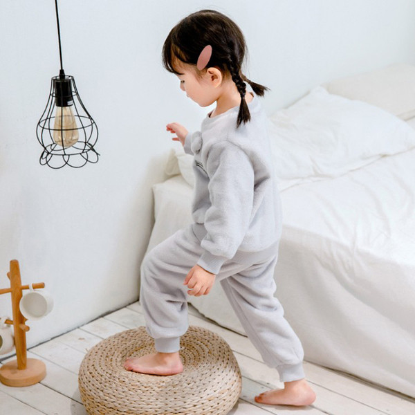 Szürke gyerekpizsama 3D elemmel lányoknak és fiúknak