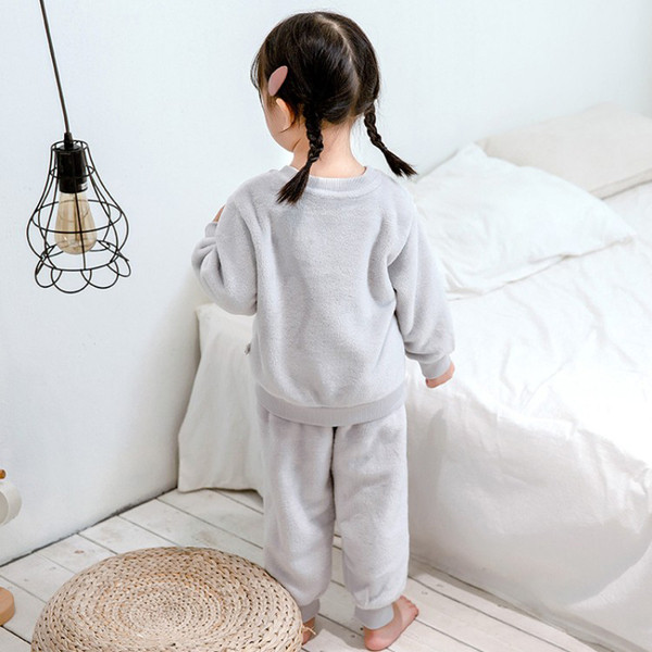 Szürke gyerekpizsama 3D elemmel lányoknak és fiúknak