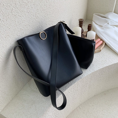 Napi női táska fém rögzítéssel és hosszú füllel