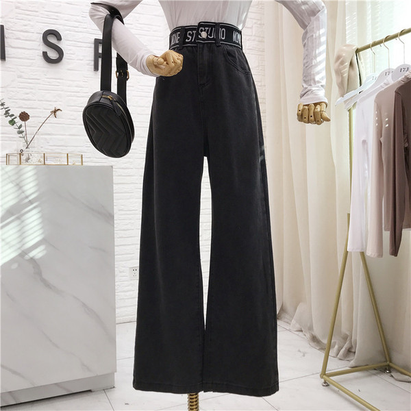 Aktuális női széles farmer, magas derékkal, fekete és kék feliratokkal