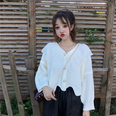 Γυναικεία ζακέτα σε μαύρο και άσπρο  χρώμα με δαντέλα