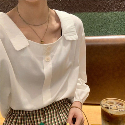 Γυναικεία μοντέρνα μπλούζα σε κόκκινο και λευκό χρώμα με κουμπιά