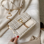 Stílusos női táska fém elemmel és lánccal három színben