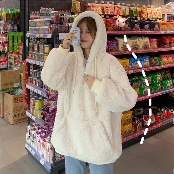 Puha női laza pulóver zsebbel és cipzárral