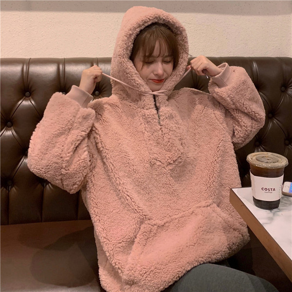 Puha női laza pulóver zsebbel és cipzárral