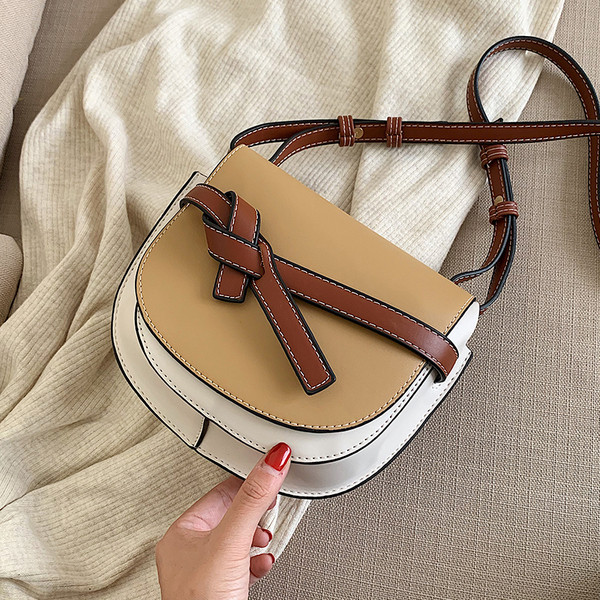 Női bőr táska hosszú füllel több színben