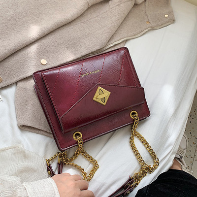 Női bőr táska fém lánccal több színben