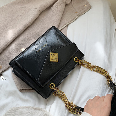 Női bőr táska fém lánccal több színben