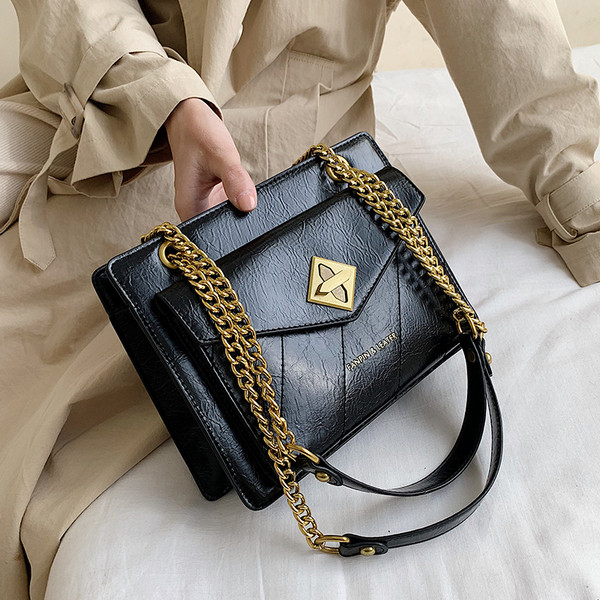 Női bőr táska fém lánccal több színben