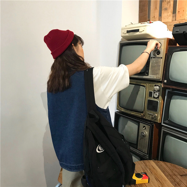 Női alkalmi farmermellény zsebekkel