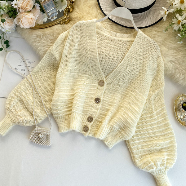 Modern női mellény széles ujjakkal, többféle színben