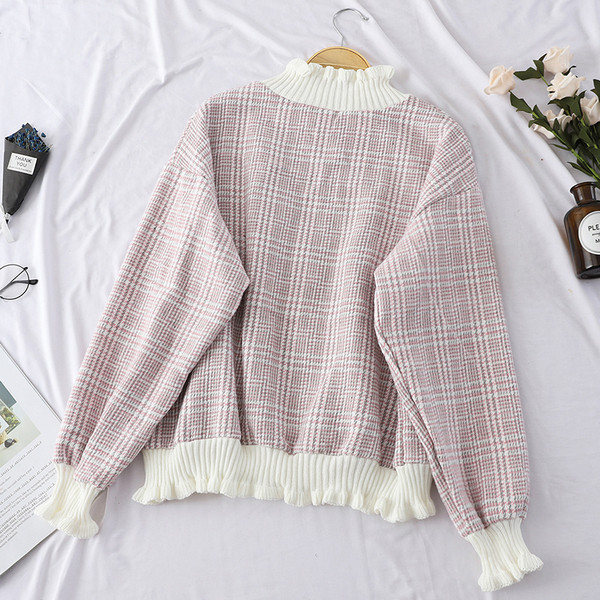 Női kockás pulóver varrott fürtökkel, különböző színekben