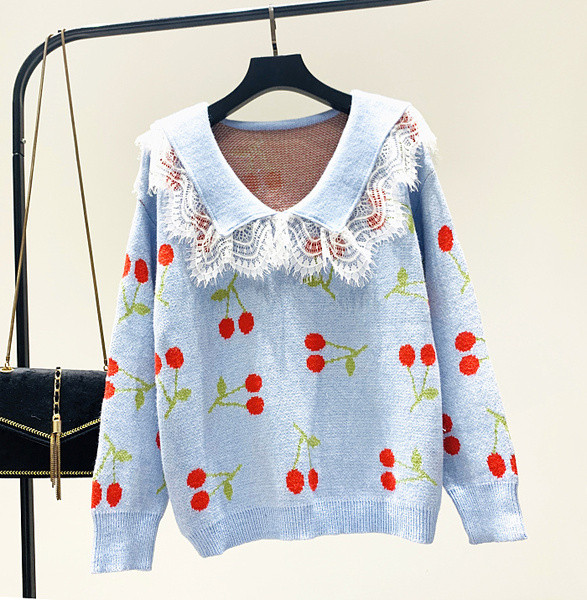 Új modell női pulóver spitz nyakkivágással és fehér, fekete, rózsaszín és kék mintával