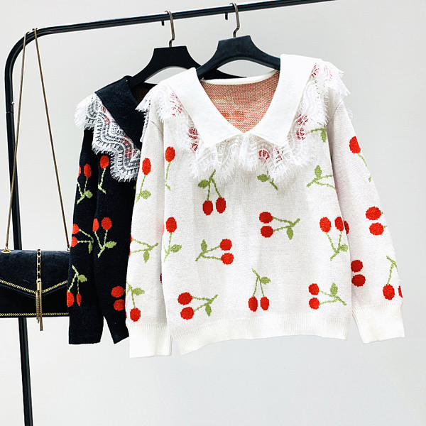 Új modell női pulóver spitz nyakkivágással és fehér, fekete, rózsaszín és kék mintával